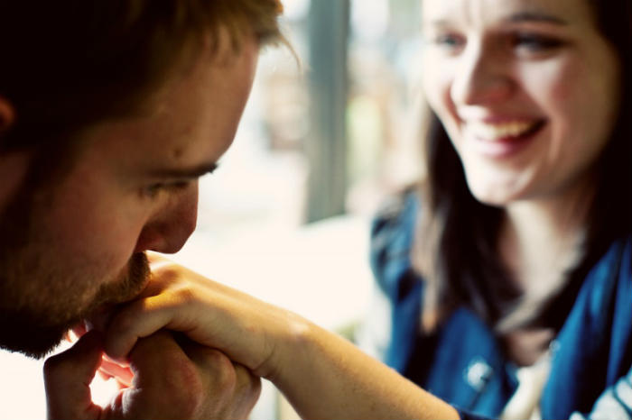 intimacy man kissing hand featured